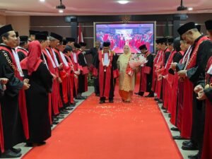 Wakil Ketua MA Pimpin Wisuda Purnabakti Ketua PT Medan, Panusunan Harahap