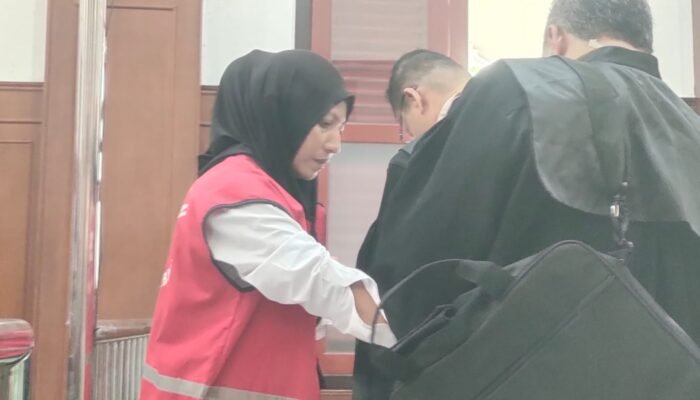 Erni Purwanti Diadli Kasus Fidusia di Pengadilan Negeri Surabaya